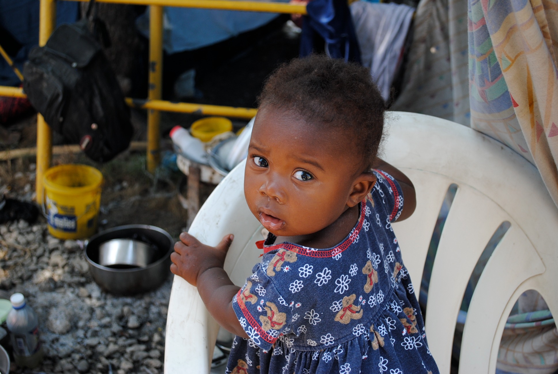 Young child from a community supported by earthquake relief work in Haiti